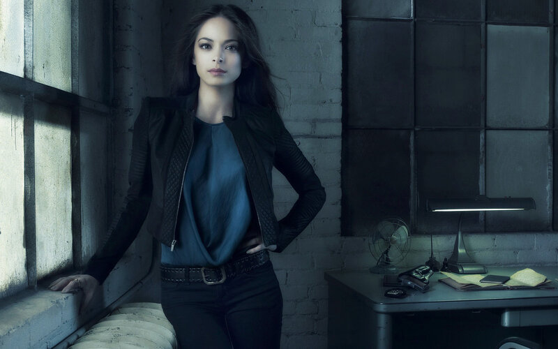 Woman in Black Jacket — Dramatic, Photograph, Desk