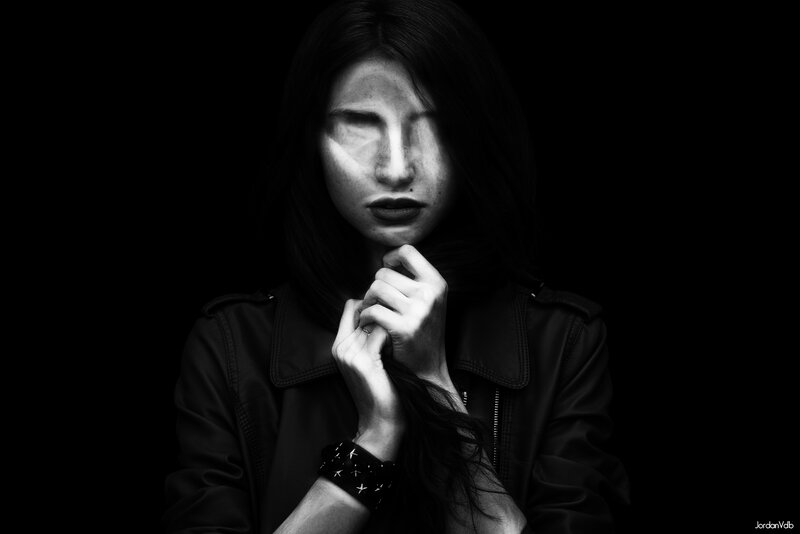Woman in Black Jacket — Dramatic, Photograph, Hand, Dark Background