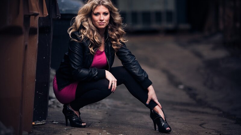 Woman in Black Jacket — Dramatic, Photograph, High Heels, Alley