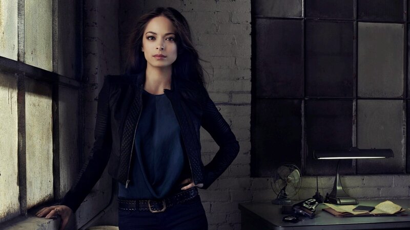 Woman in Black Jacket — Serious, Photograph, Desk, Lamp