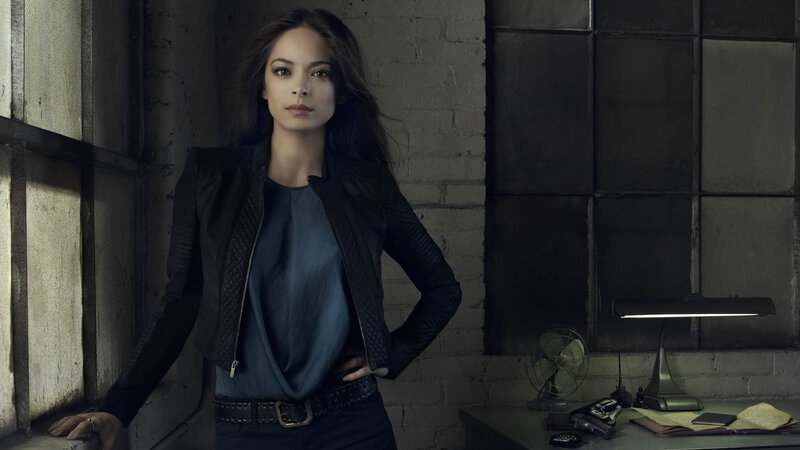 Woman in Black Jacket — Serious, Photograph, Desk