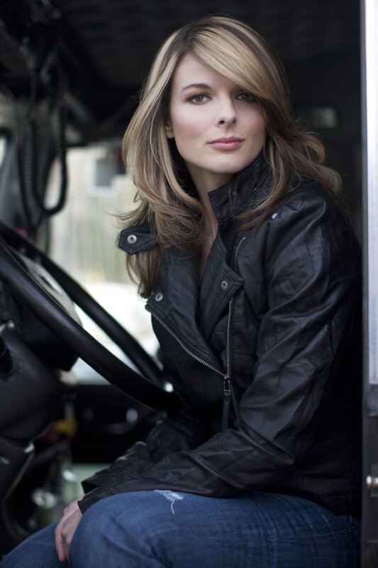 woman in black jacket sitting inside vehicle