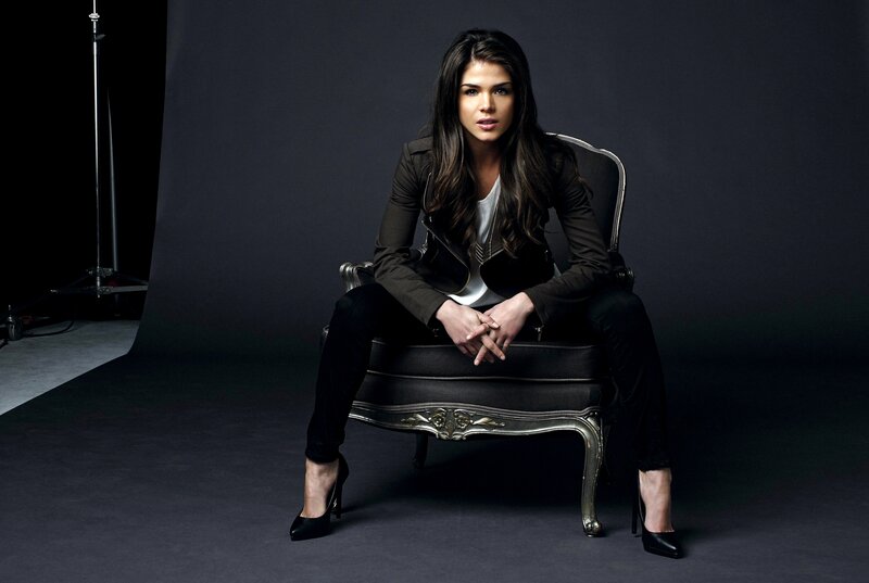woman in black jacket sitting