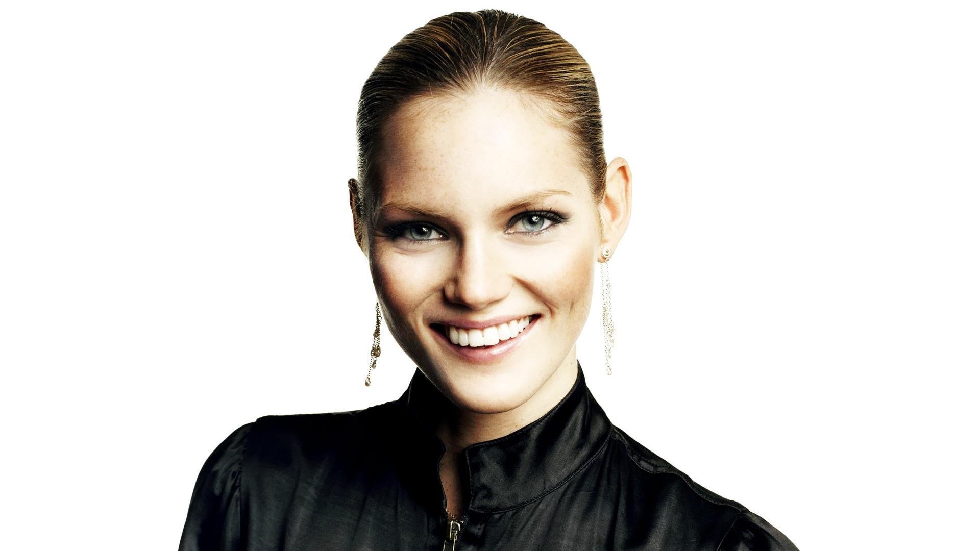 woman in black jacket smiling