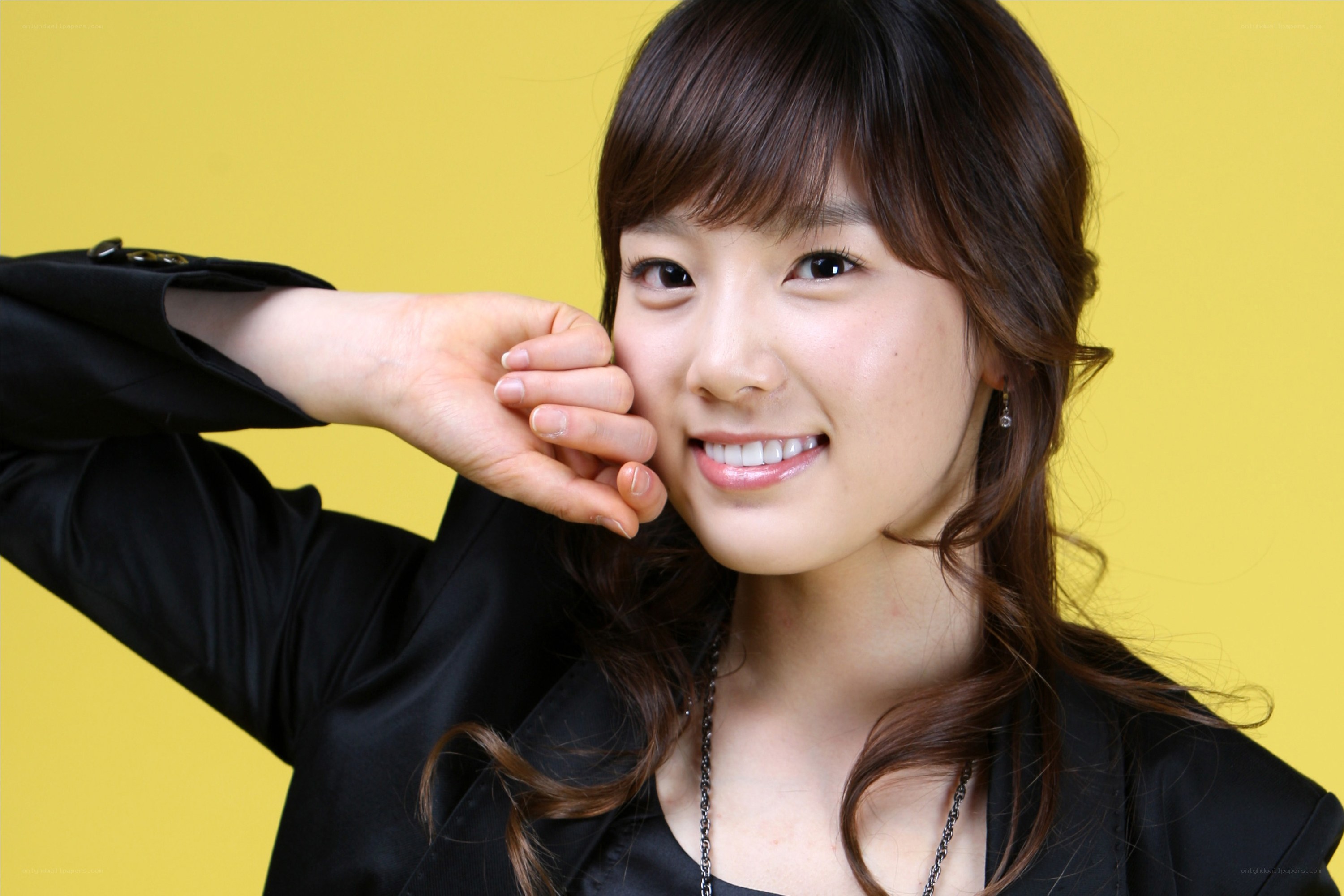 woman in black jacket smiling