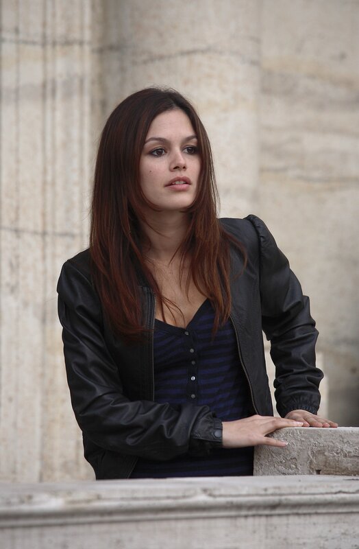 woman in black jacket standing
