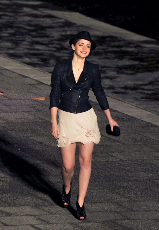 Woman in black jacket walking