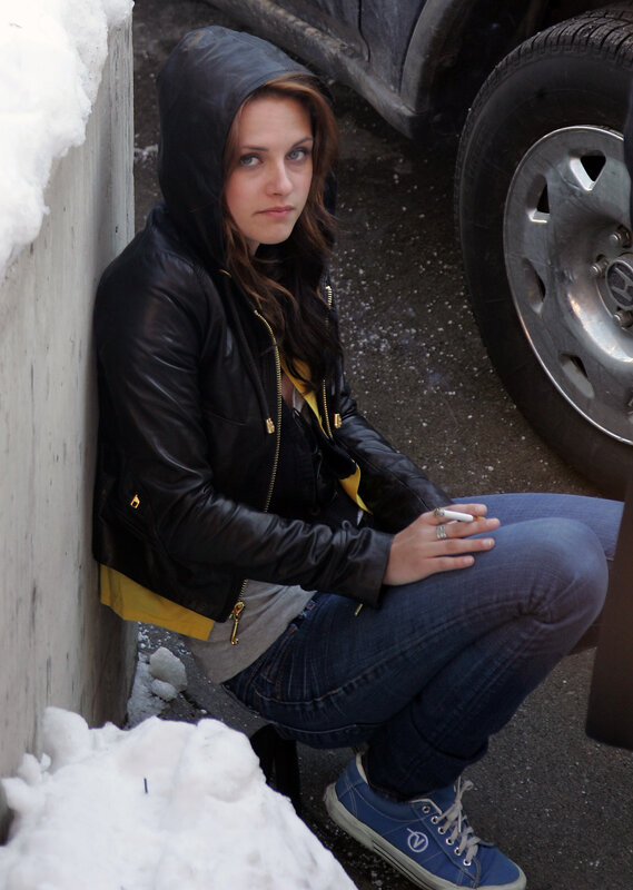 woman in black jacket with cigarette