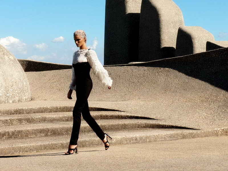 Woman in Black Jumpsuit — Dramatic