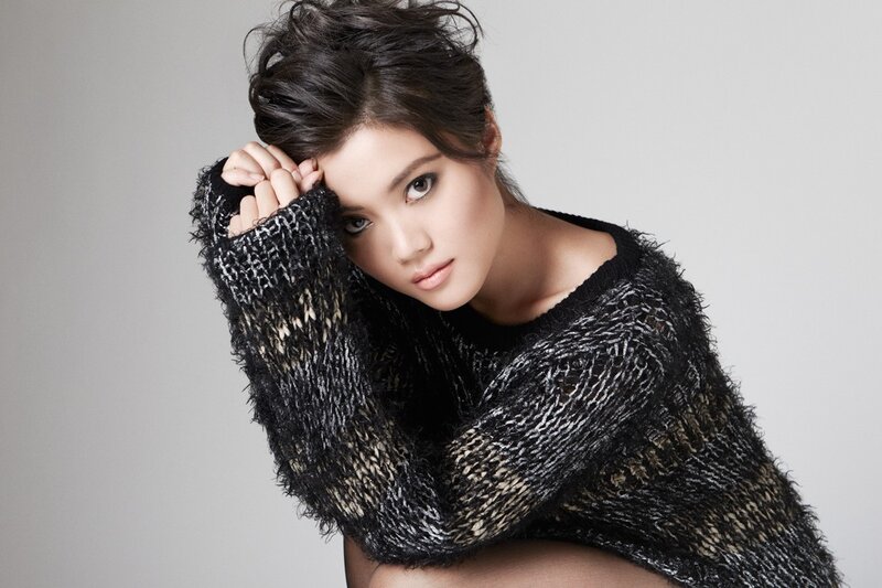woman in black knit sweater