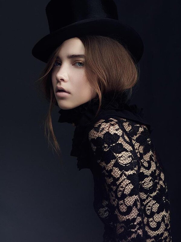 woman in black lace and top hat