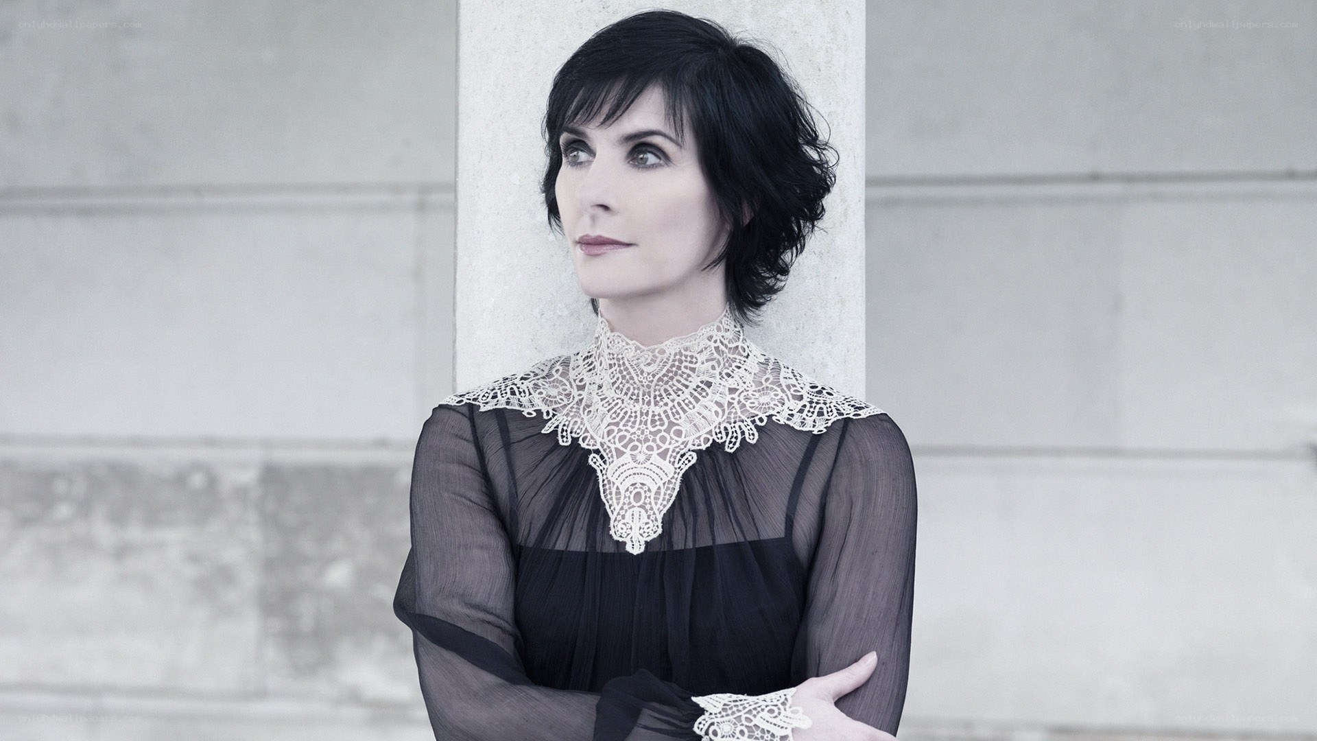 woman in black lace dress