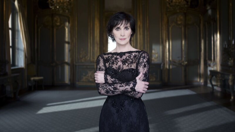 woman in black lace dress