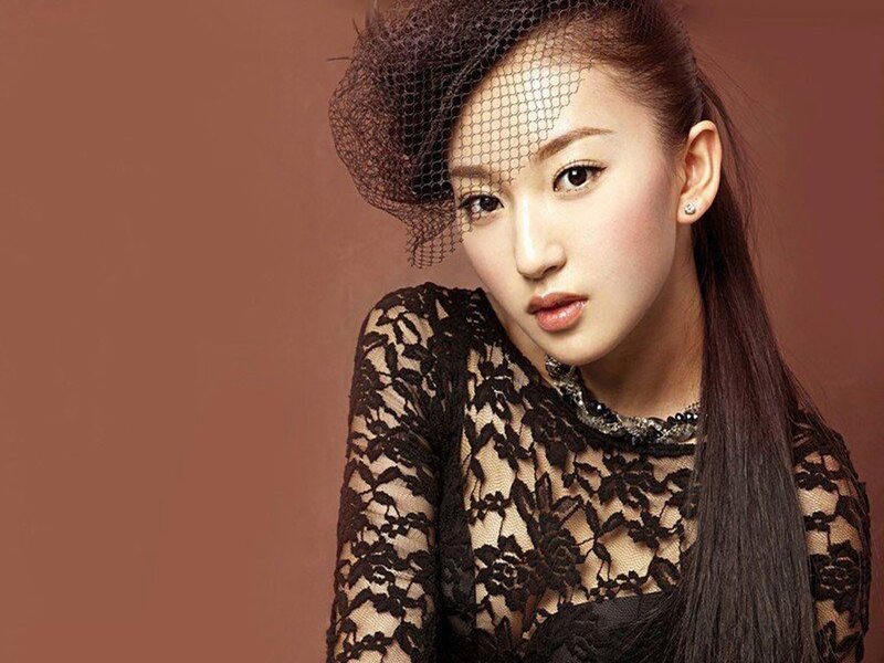 Woman in Black Lace Dress — Brown, Dramatic, Photograph