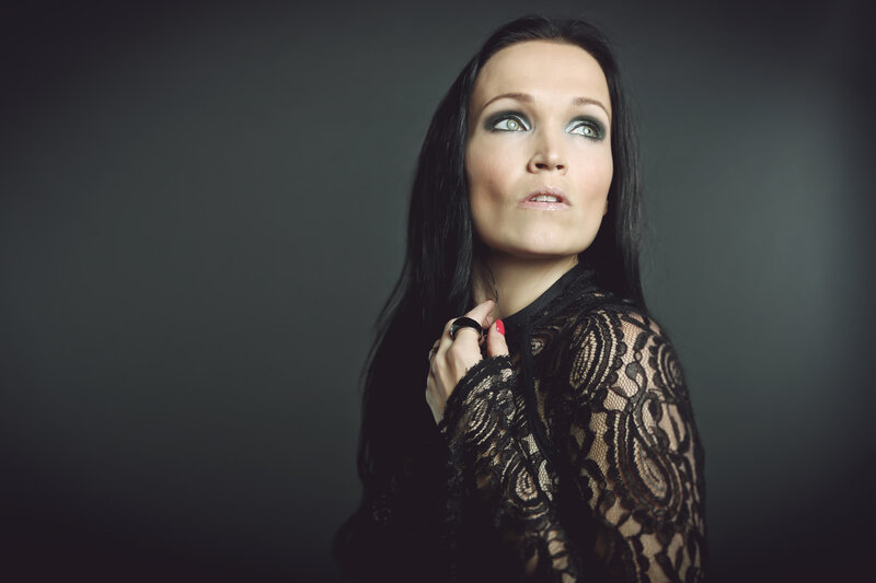 woman in black lace looking up