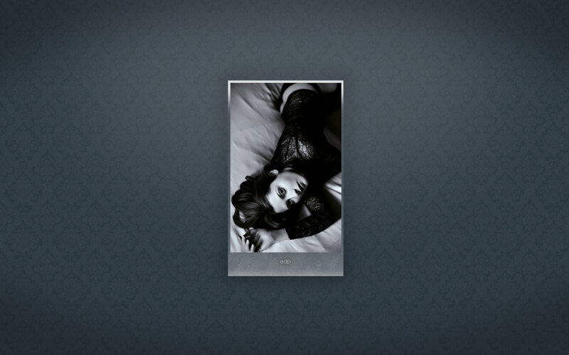 woman in black lace lying down