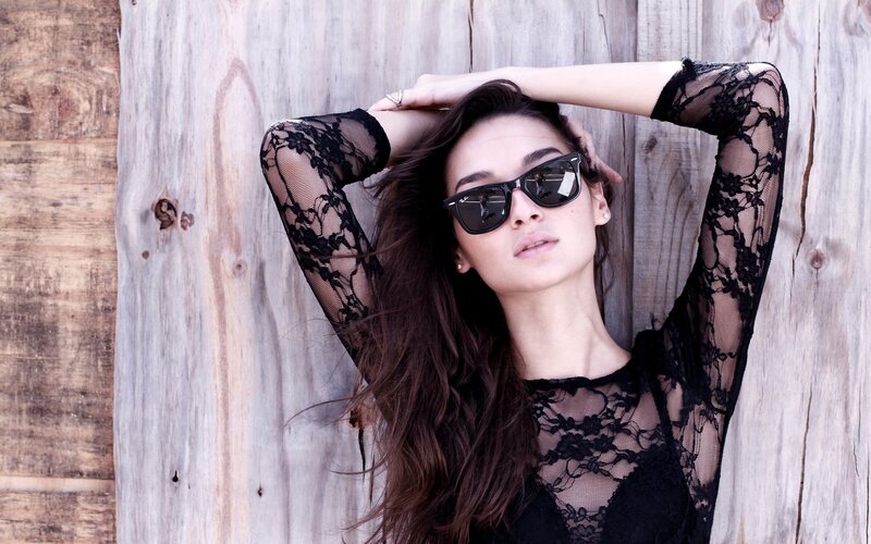 woman in black lace top