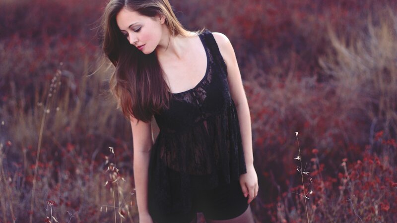 woman in black lace top