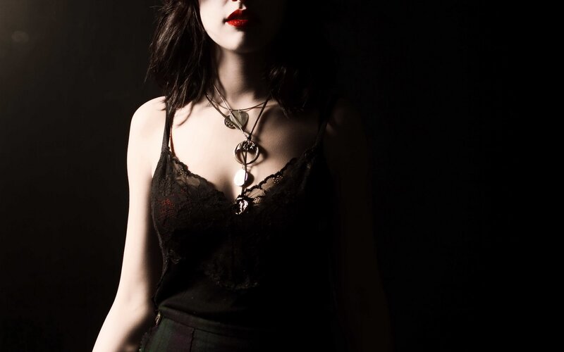 woman in black lace top