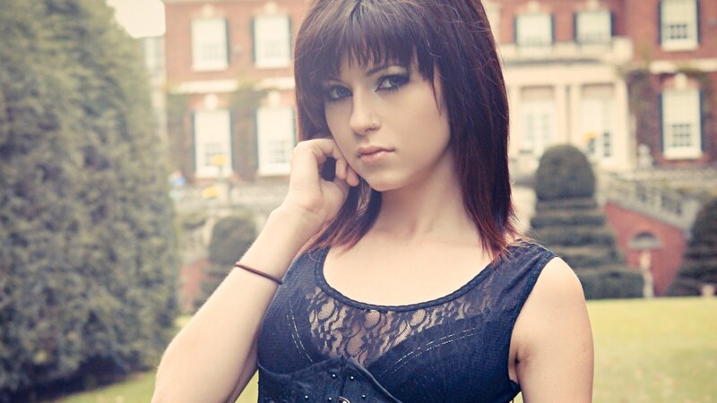 woman in black lace top