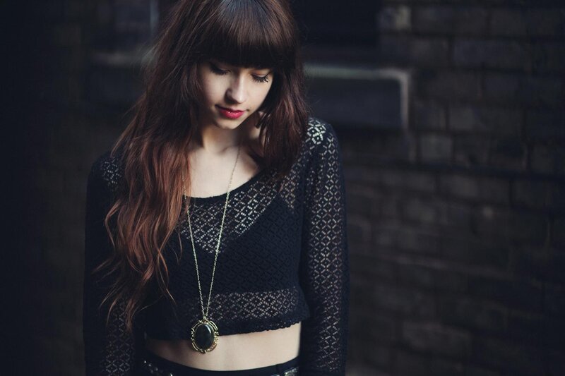 woman in black lace top