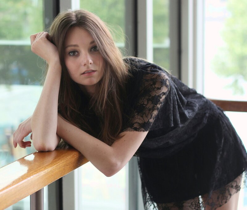 woman in black lace top
