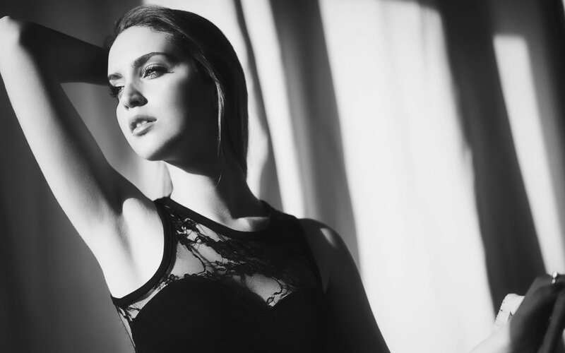 woman in black lace top