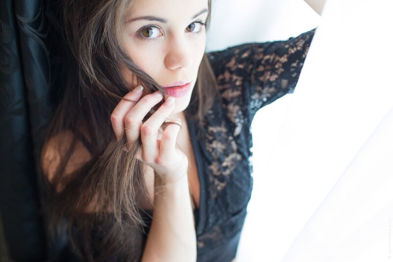 woman in black lace top