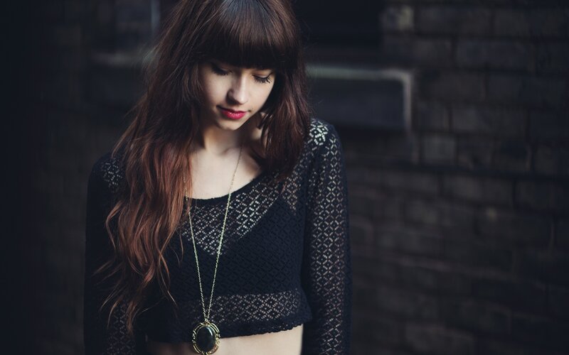 woman in black lace top