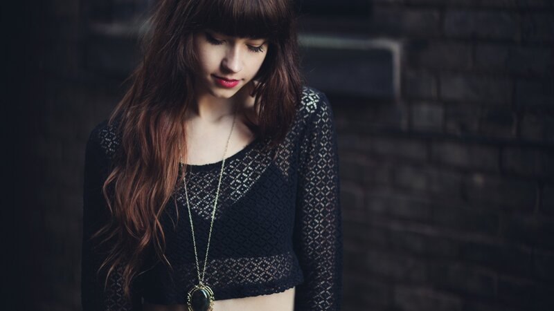 woman in black lace top