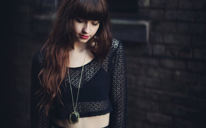woman in black lace top