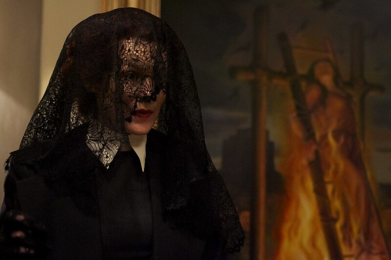 Woman in black lace veil