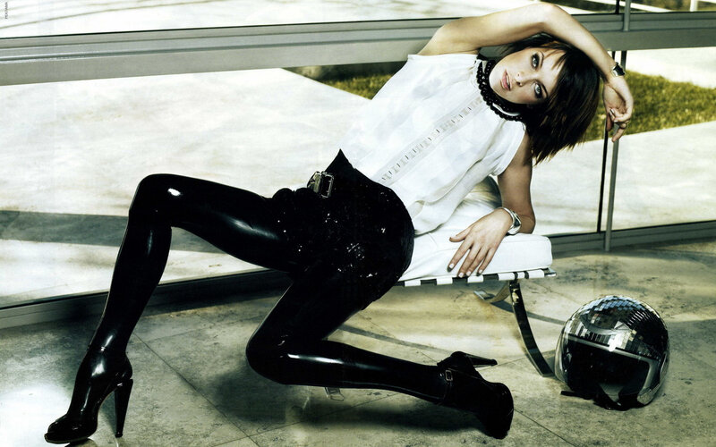 woman in black latex pants
