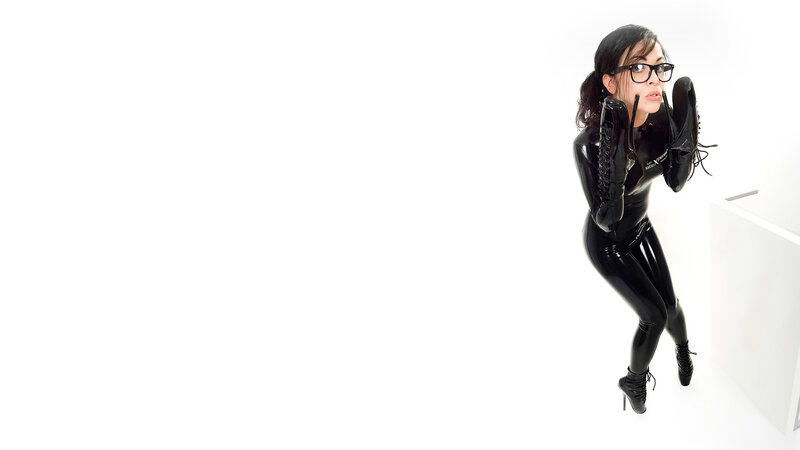woman in black latex suit