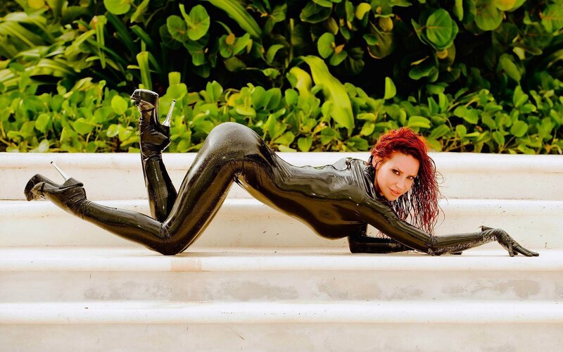 woman in black latex suit