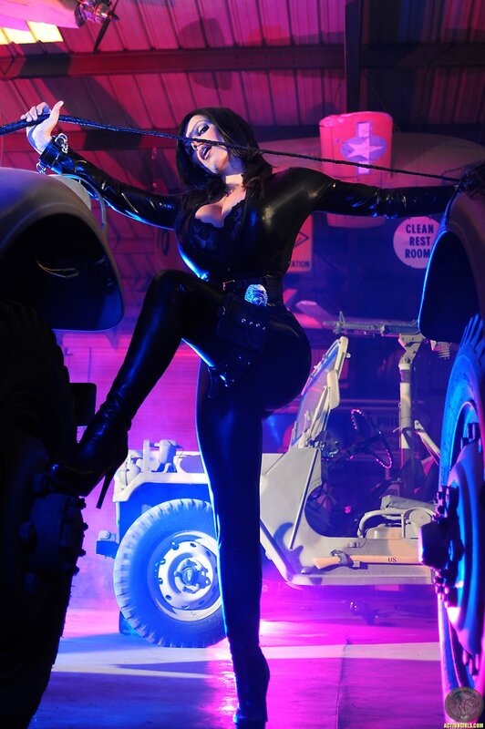 woman in black leather costume