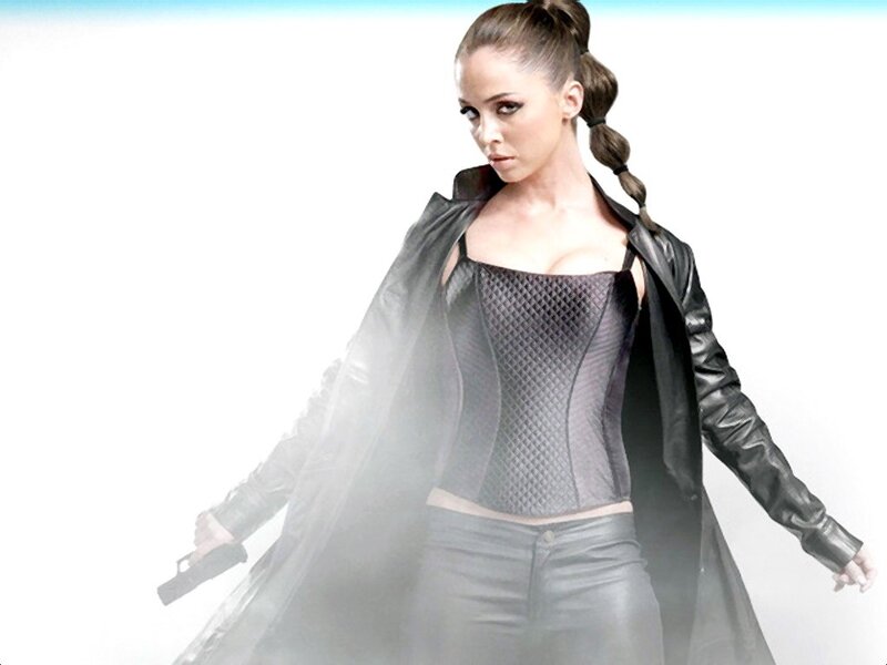 Woman in Black Leather — Dramatic, Photograph, Gun, Leather Jacket, Braid
