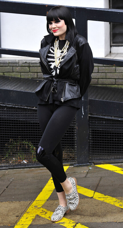woman in black leather jacket