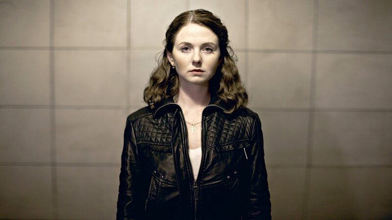 woman in black leather jacket
