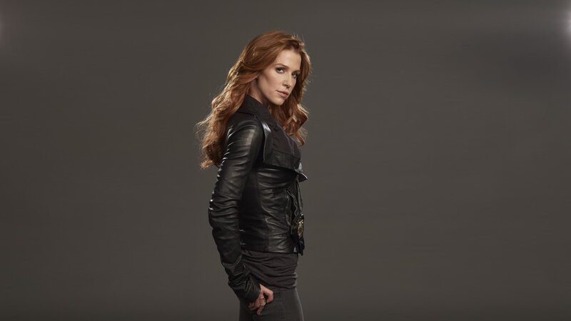 woman in black leather jacket