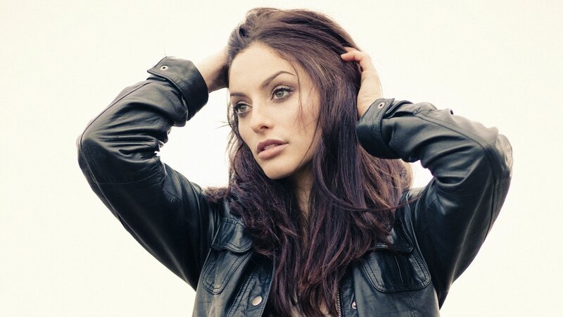 woman in black leather jacket
