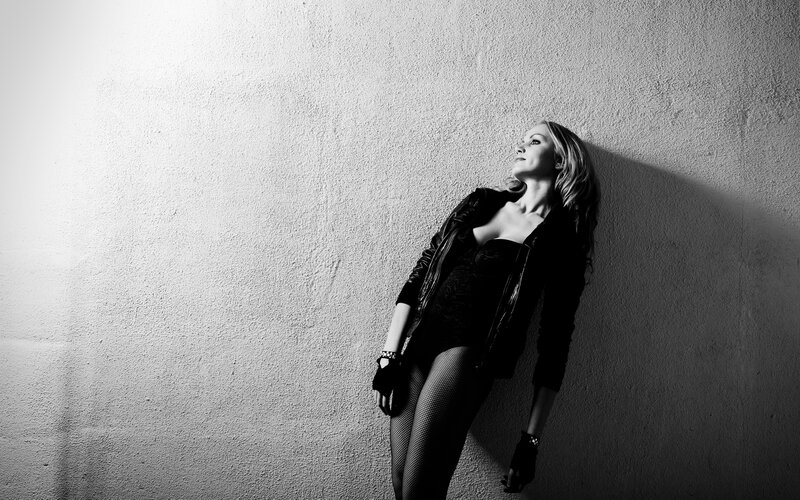 woman in black leather jacket
