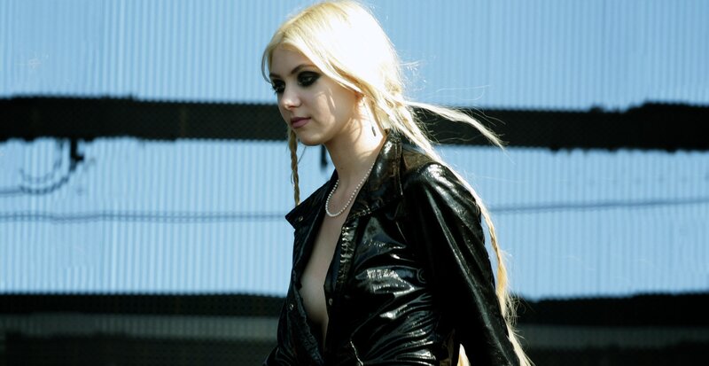 woman in black leather jacket