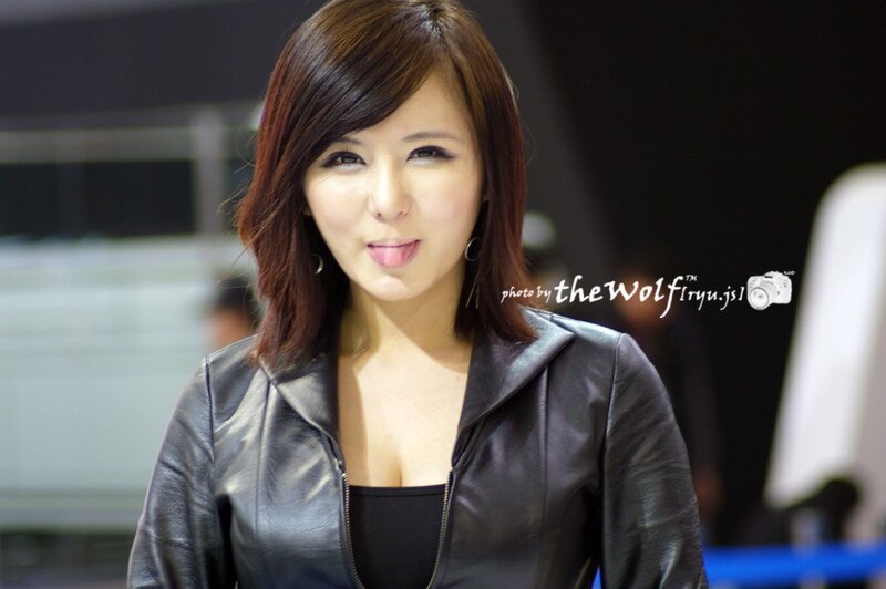 woman in black leather jacket