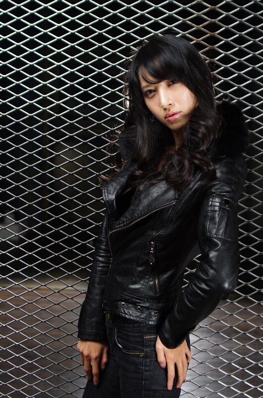 woman in black leather jacket