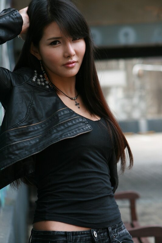 woman in black leather jacket