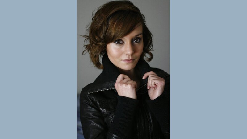 woman in black leather jacket