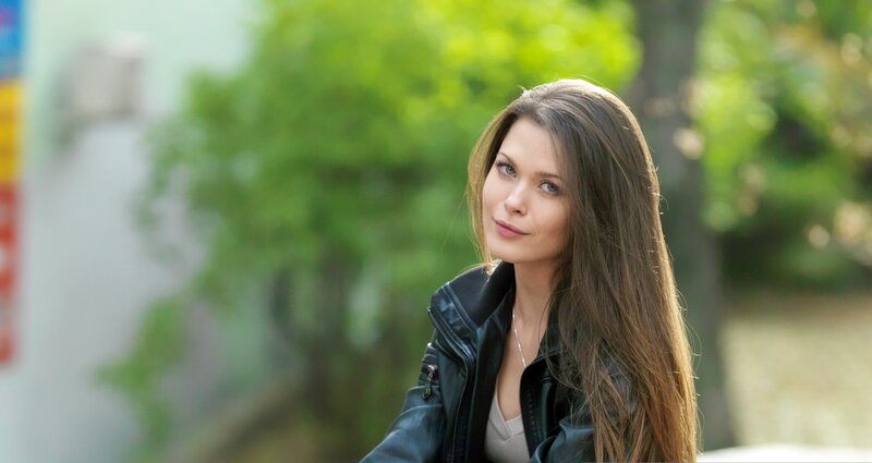 woman in black leather jacket