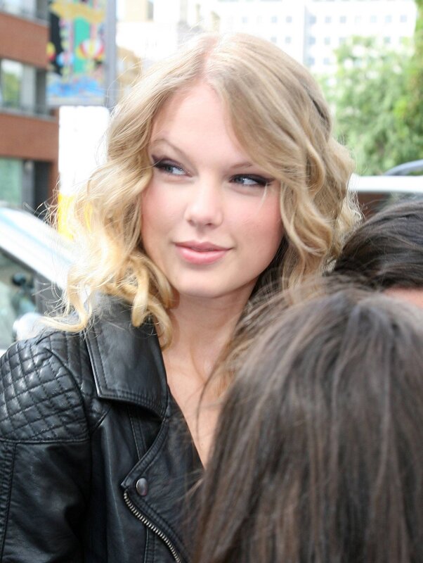 woman in black leather jacket