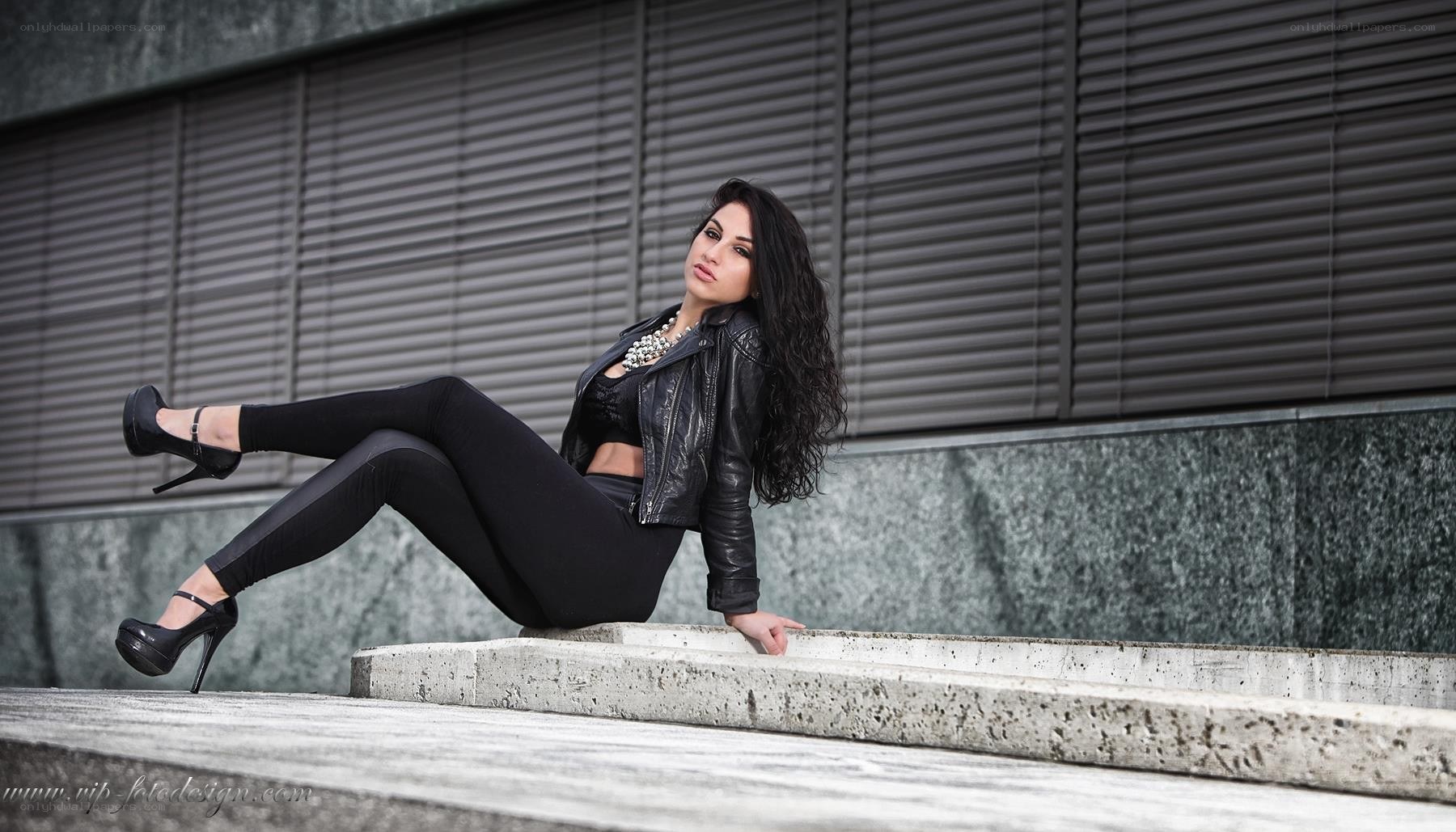 woman in black leather jacket